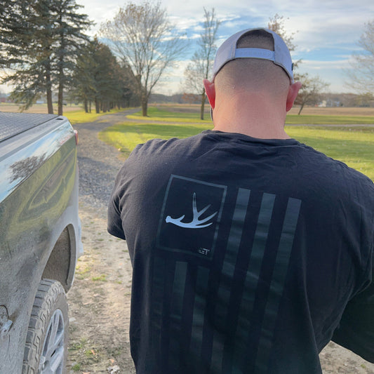 man wearing long sleeve black shirt antler II